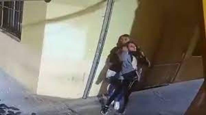VIDEO: Female German tourist left unconscious after being strangled during violent street robbery in Malaga